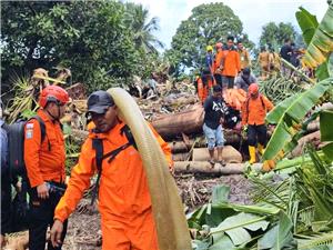 Flash floods in Indonesia kill at least 16 people and sweep away homes