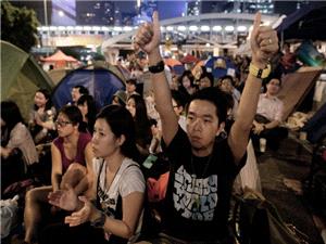 Hong Kong students dissolve pro-democracy group under `severe` pressure