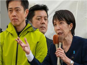 Japan`s first female prime minister counts on her popularity to help her party win Sunday`s election
