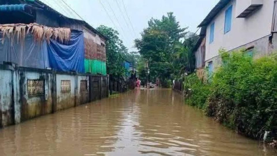 Due to heavy rains, water from Myanmar’s Bago River enters low-lying areas