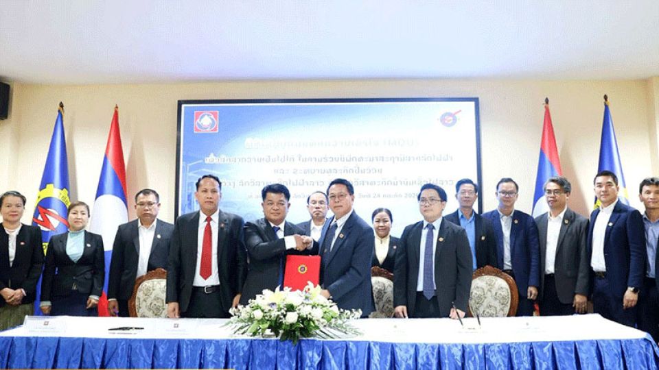 Laos state enterprises join forces to expand EV charging network