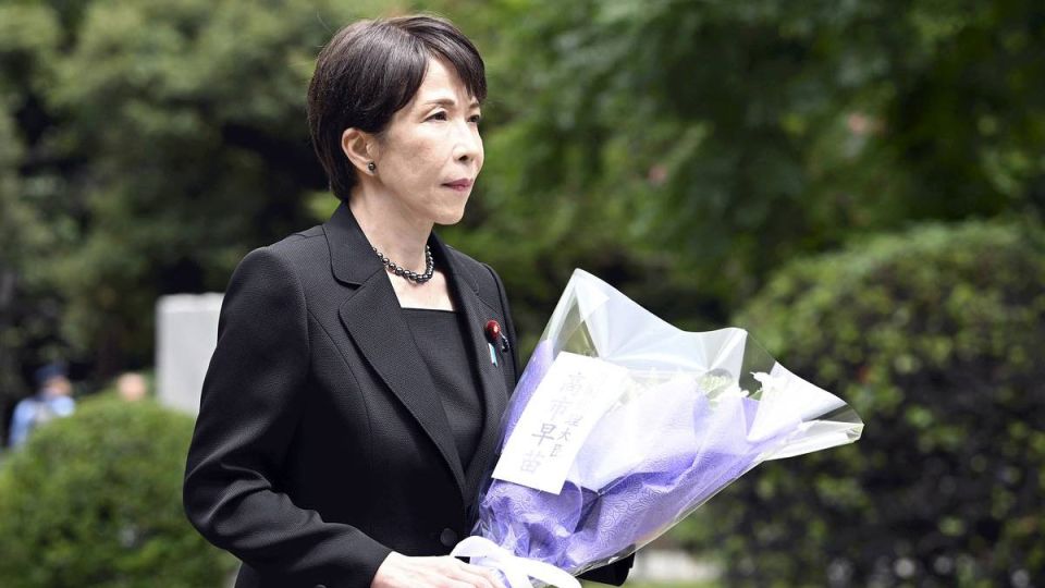 Japan Prime Minister Takaichi bows toward Yasukuni Shrine from a distance to avoid diplomatic strain