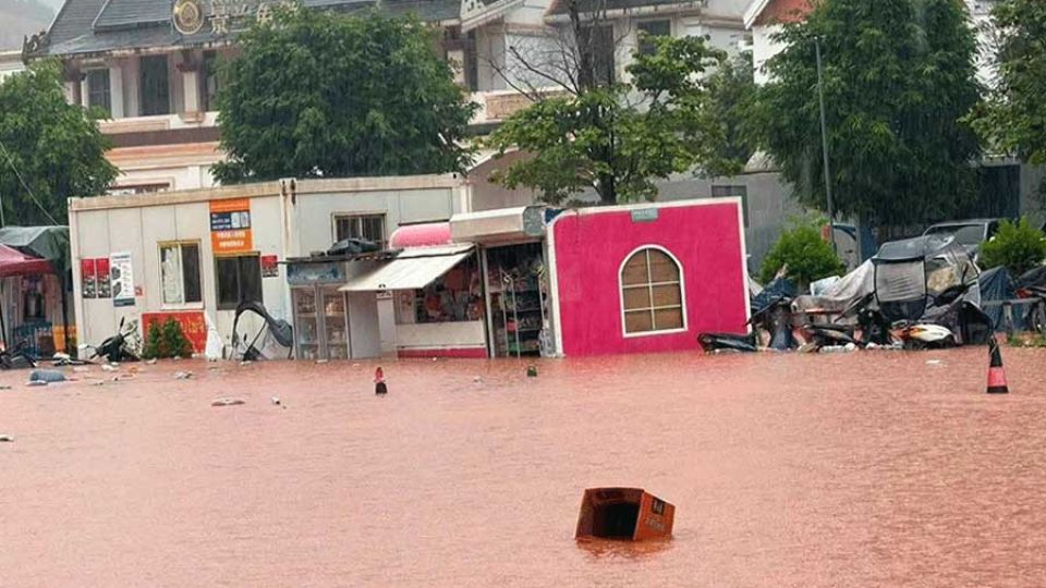 Floodwaters surge around Laos-China border crossing as province declares disaster zone