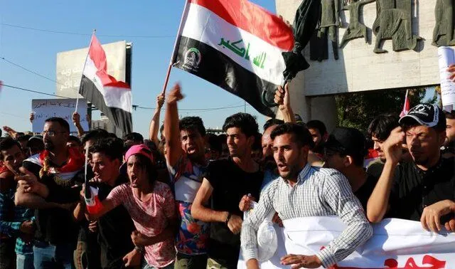 معترضان در نجف خواستار لغو فوری ممنوعیت پروازهای ایران شدند